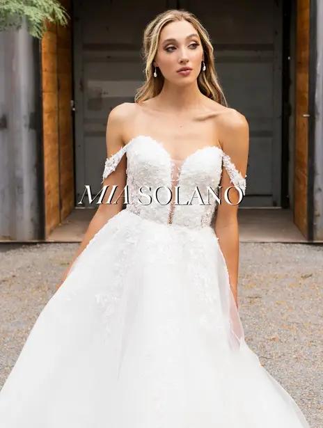 Model wearing Mia Solano bridal gown
