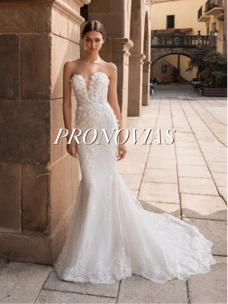 Model wearing a white gown by Pronovias